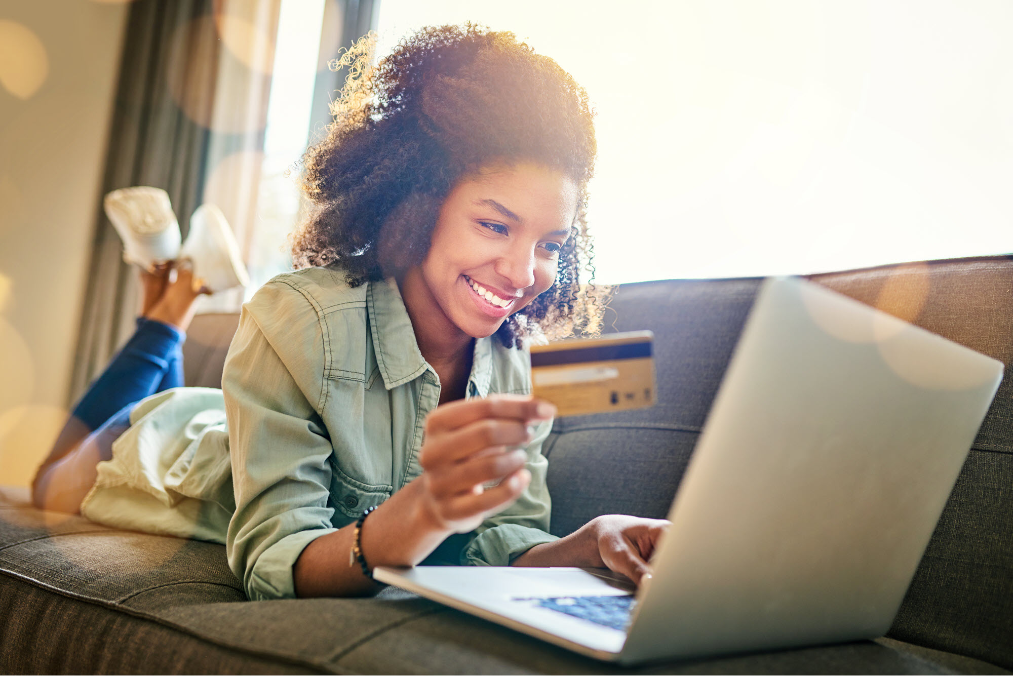 young woman with debit card