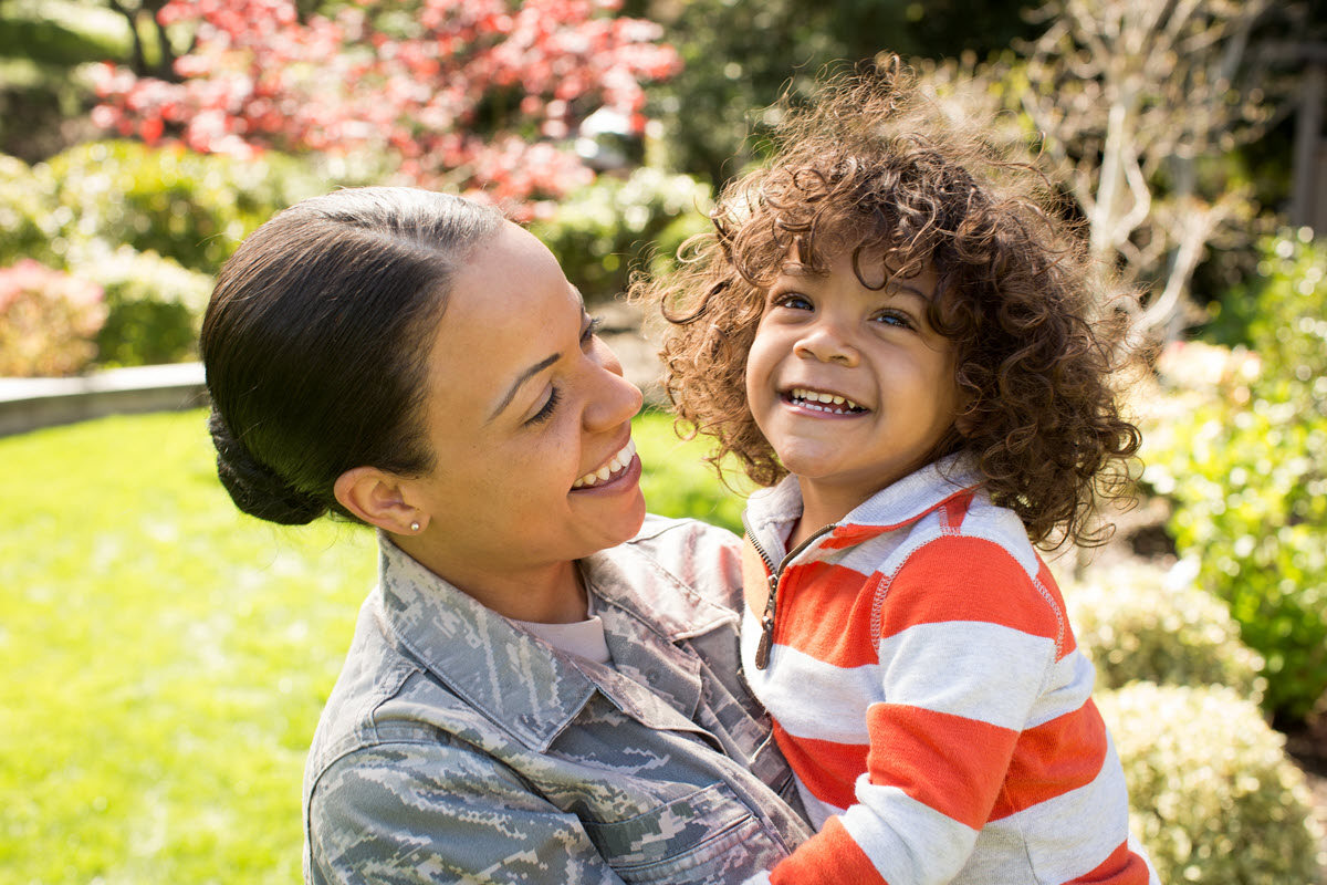 military mother and son smiling