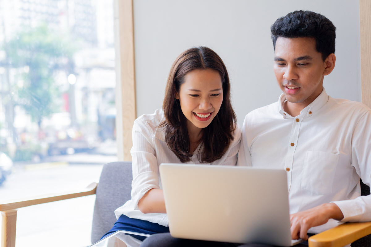 couple looking at a computer