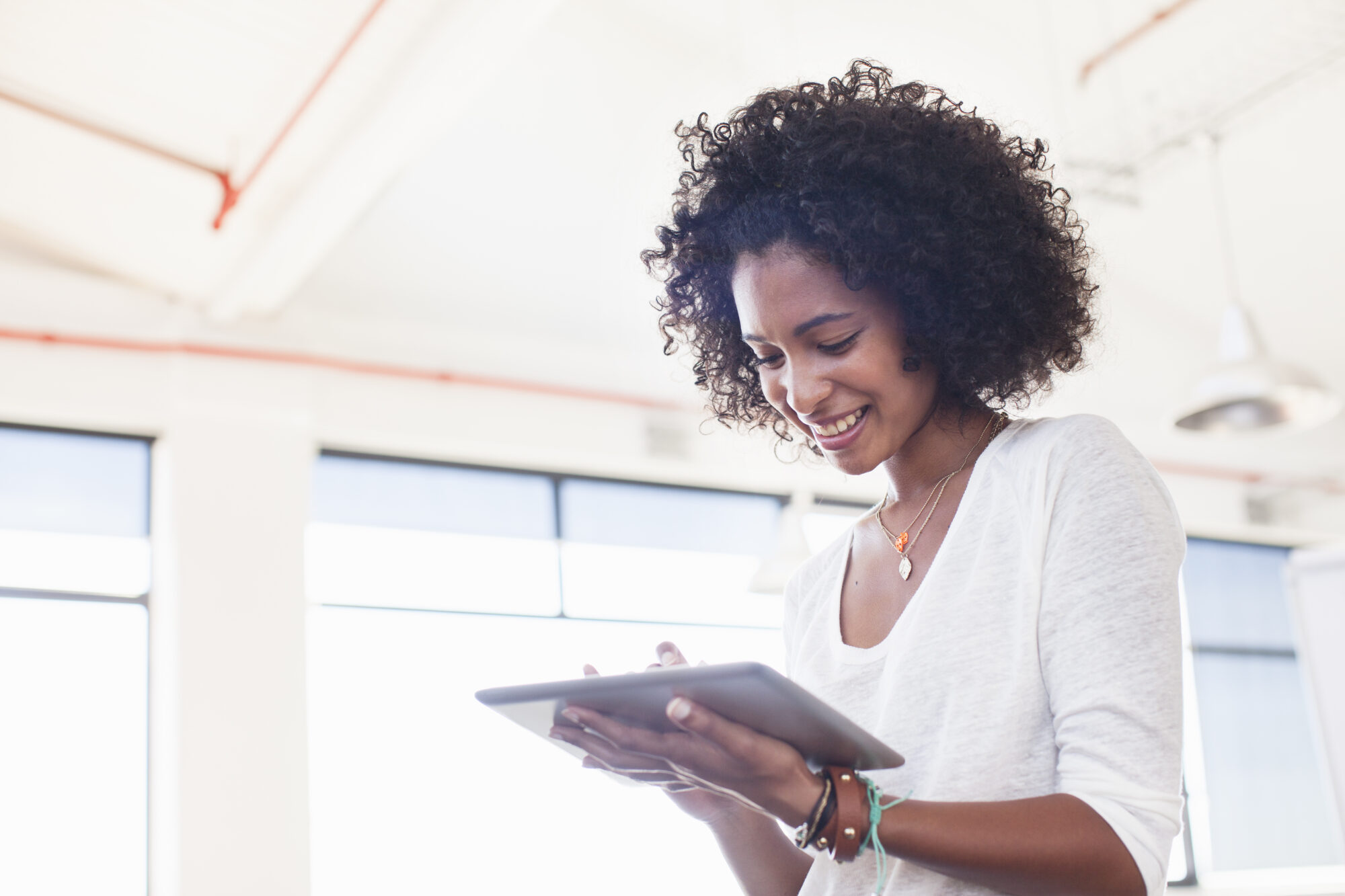 Businesswoman using digital tablet in office
